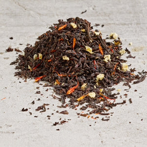 Lychee Peach: Loose leaf Indian black tea leaves with peaches and safflower petals
